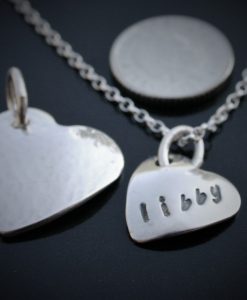 Medium, Mini and a 5 pence coin