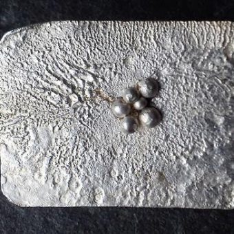 reticulated brooch